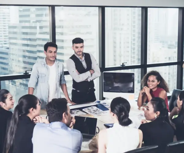 A team debating around a table