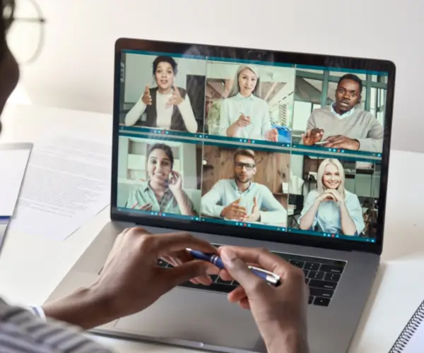 A video meeting on a laptop